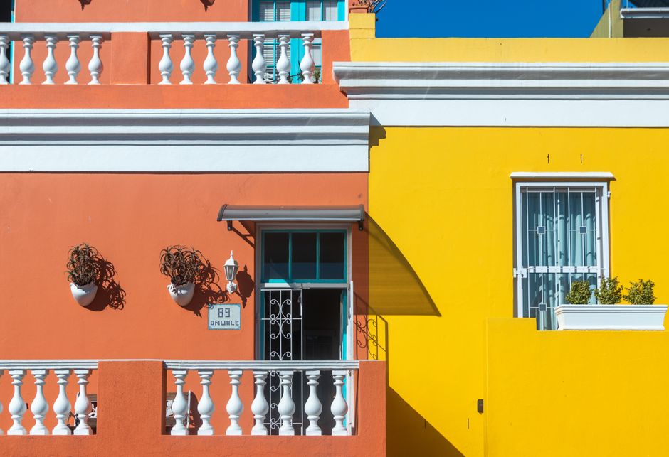 Orange and yellow painted house walls.