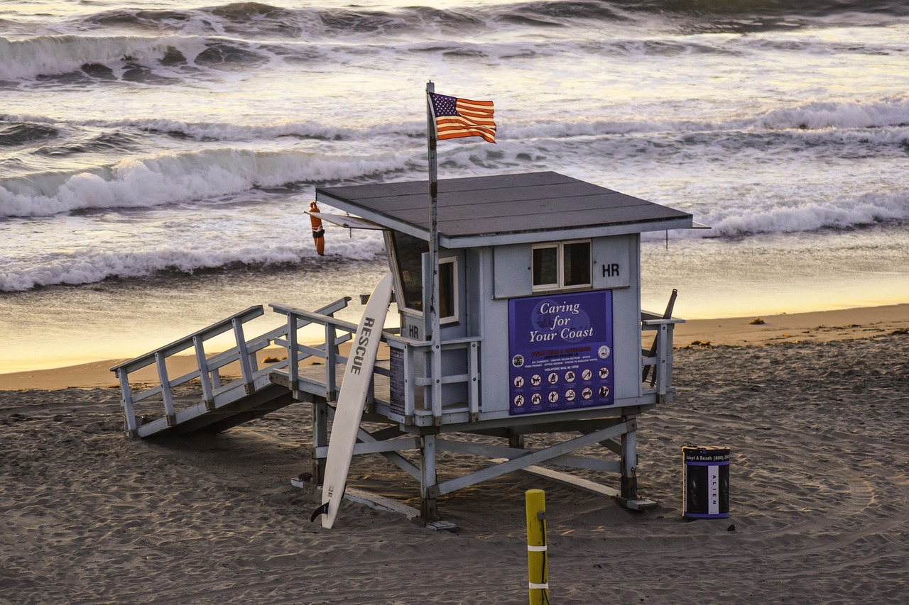 A lifeguard tower on a sandy beach